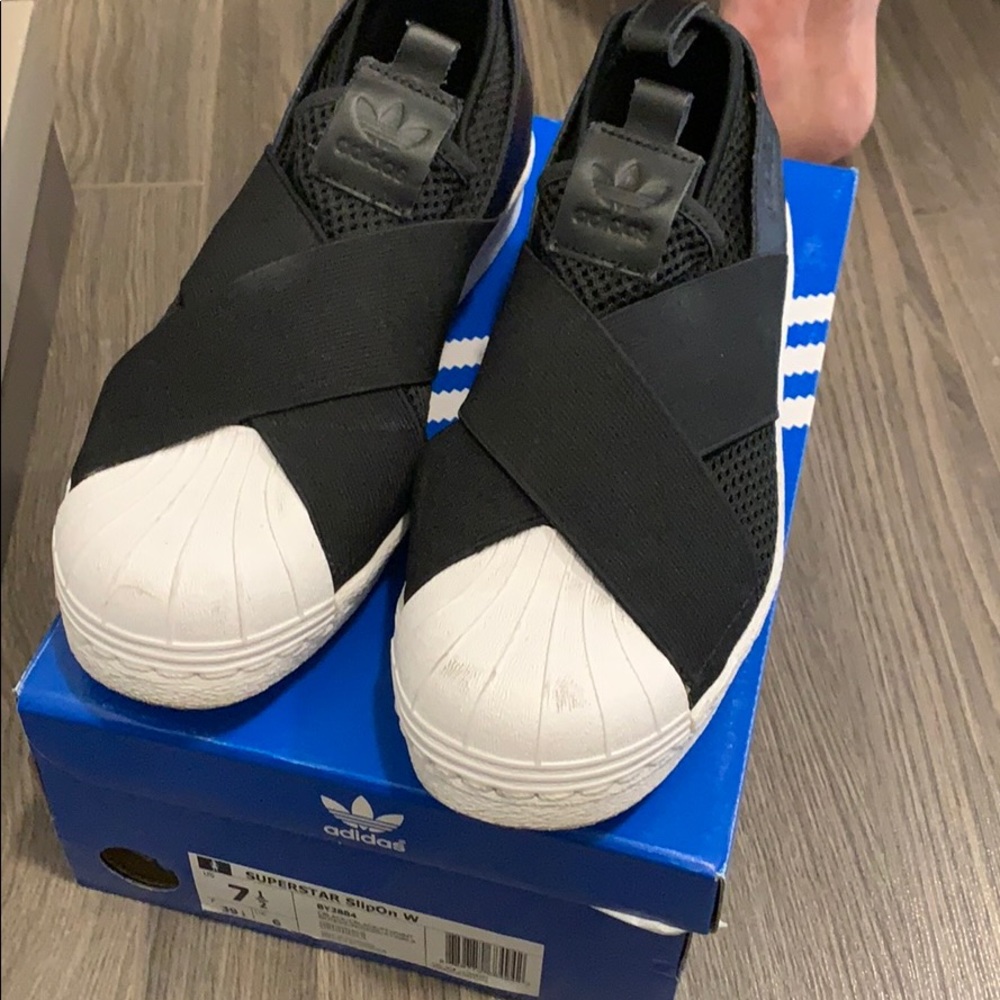 Black superstar slip on